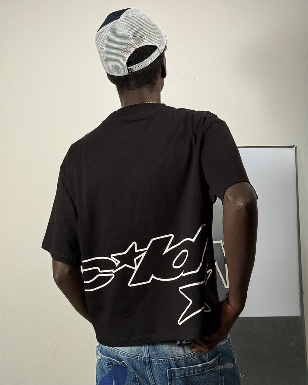 DEFENSE TEE BLACK - black oversized tee, back view on male model - Cold Culture #man