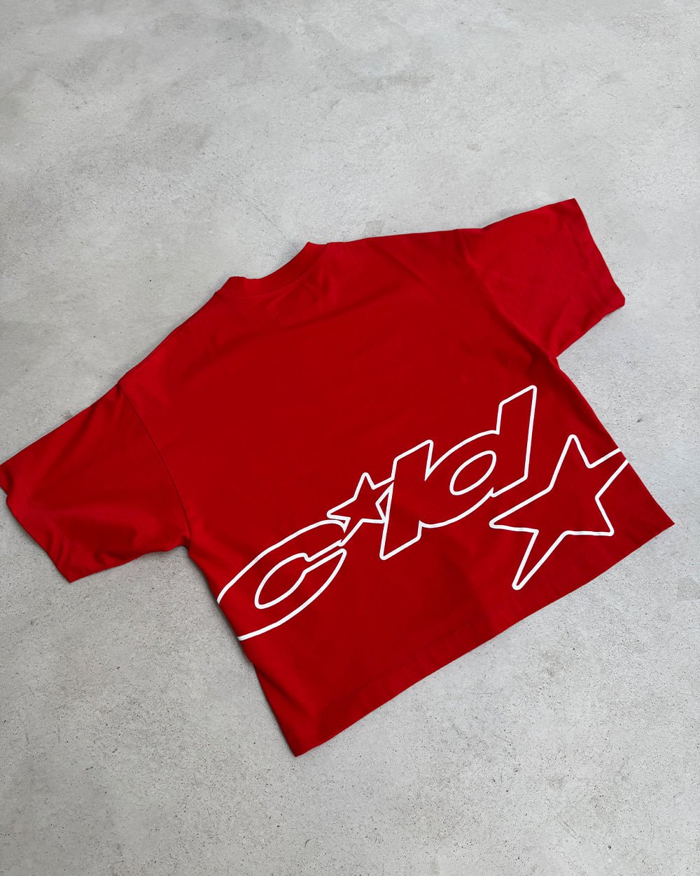 DEFENSE TEE RED - red graphic print tee, flat lay - Cold Culture