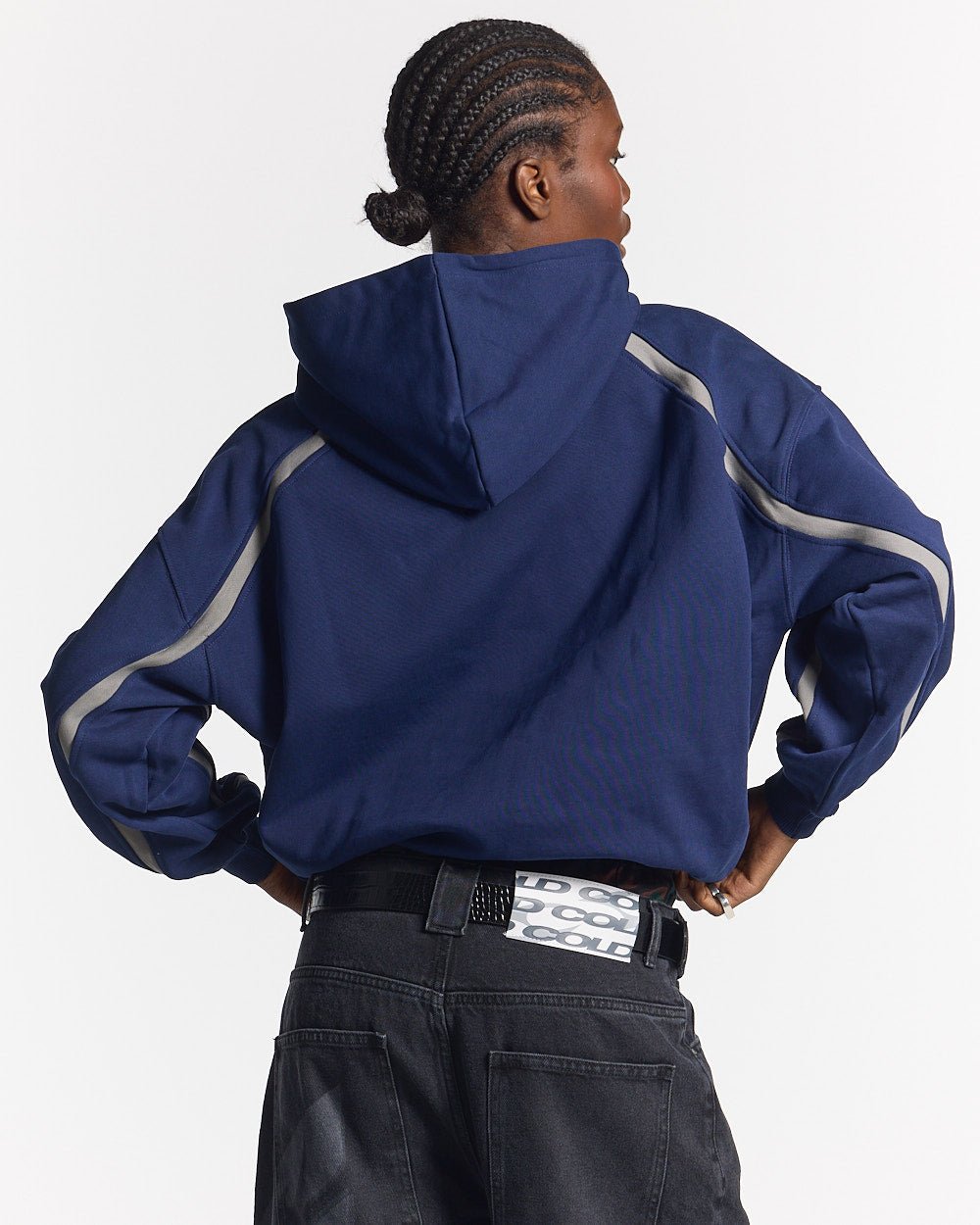 DETAILED HOODIE INDIGO BLUE - navy hoodie with contrast piping, back view on female model - Cold Culture #woman