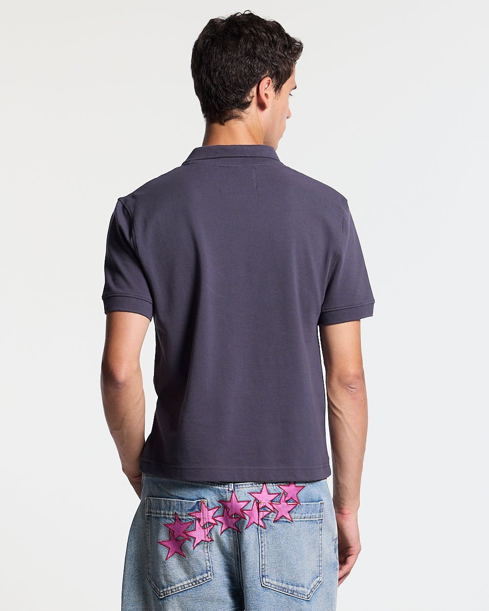 DIRTY SKULL POLO DARK GREY - dark grey graphic polo shirt, back view on male model - Cold Culture #man