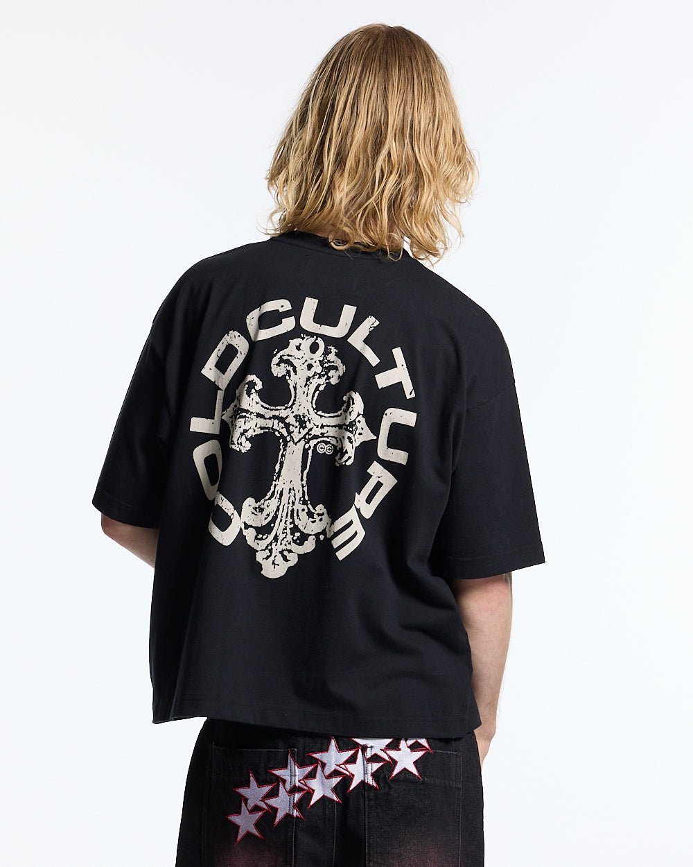 DISCHARGE TEE BLACK - black oversized graphic tee, back view on male model - Cold Culture #man