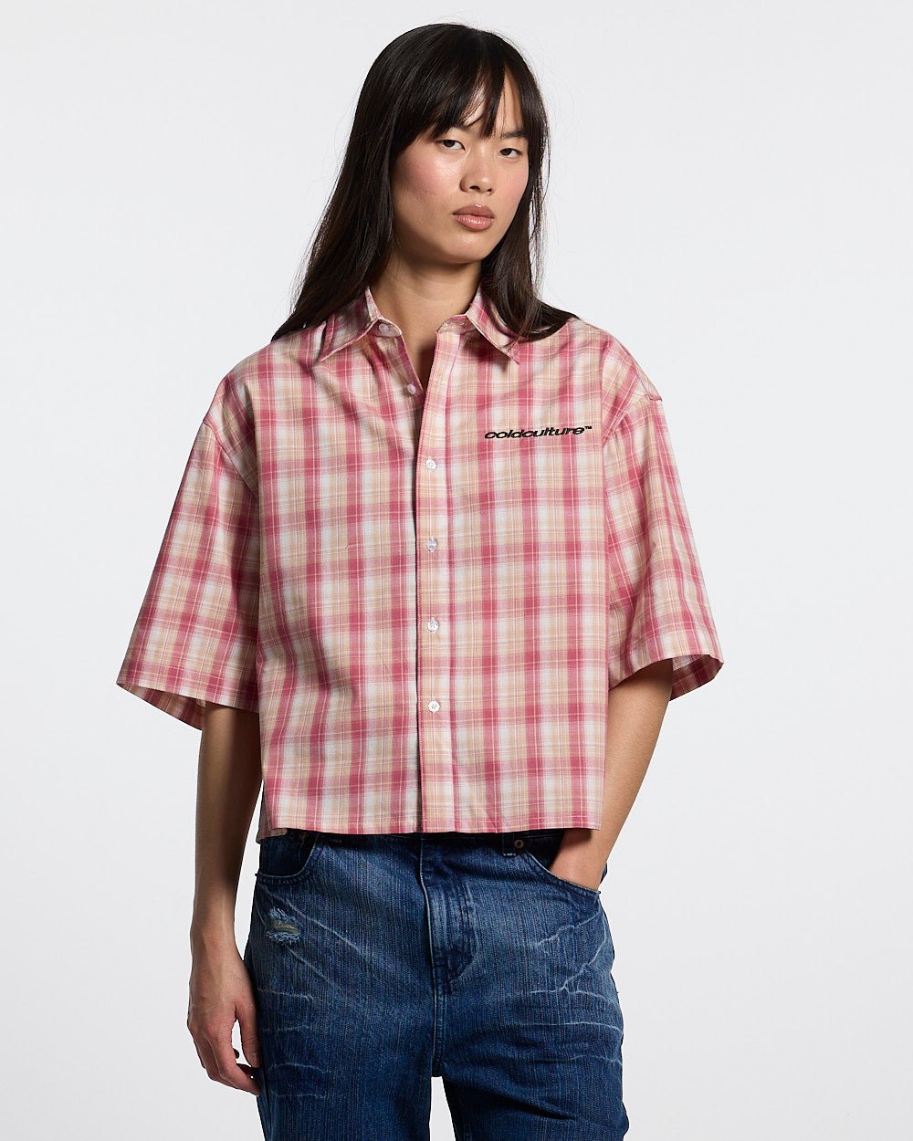 DISTORTED CHECK SHIRT - pink checked short sleeve shirt, front view on female model - Cold Culture #woman