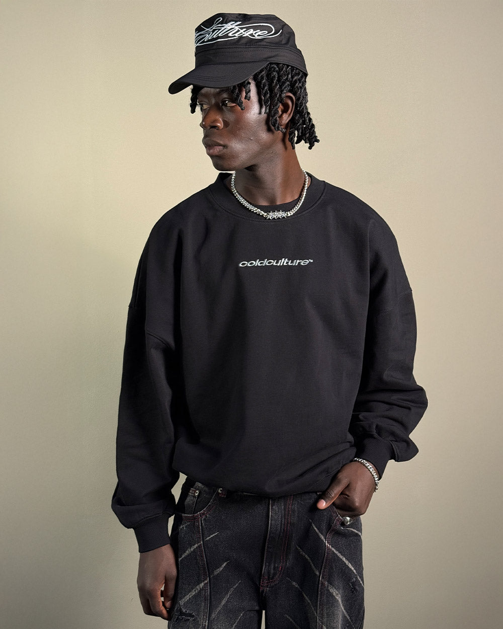 DISTRESS CURVED CREWNECK BLACK - black distressed crewneck sweatshirt, front view on male model - Cold Culture #man