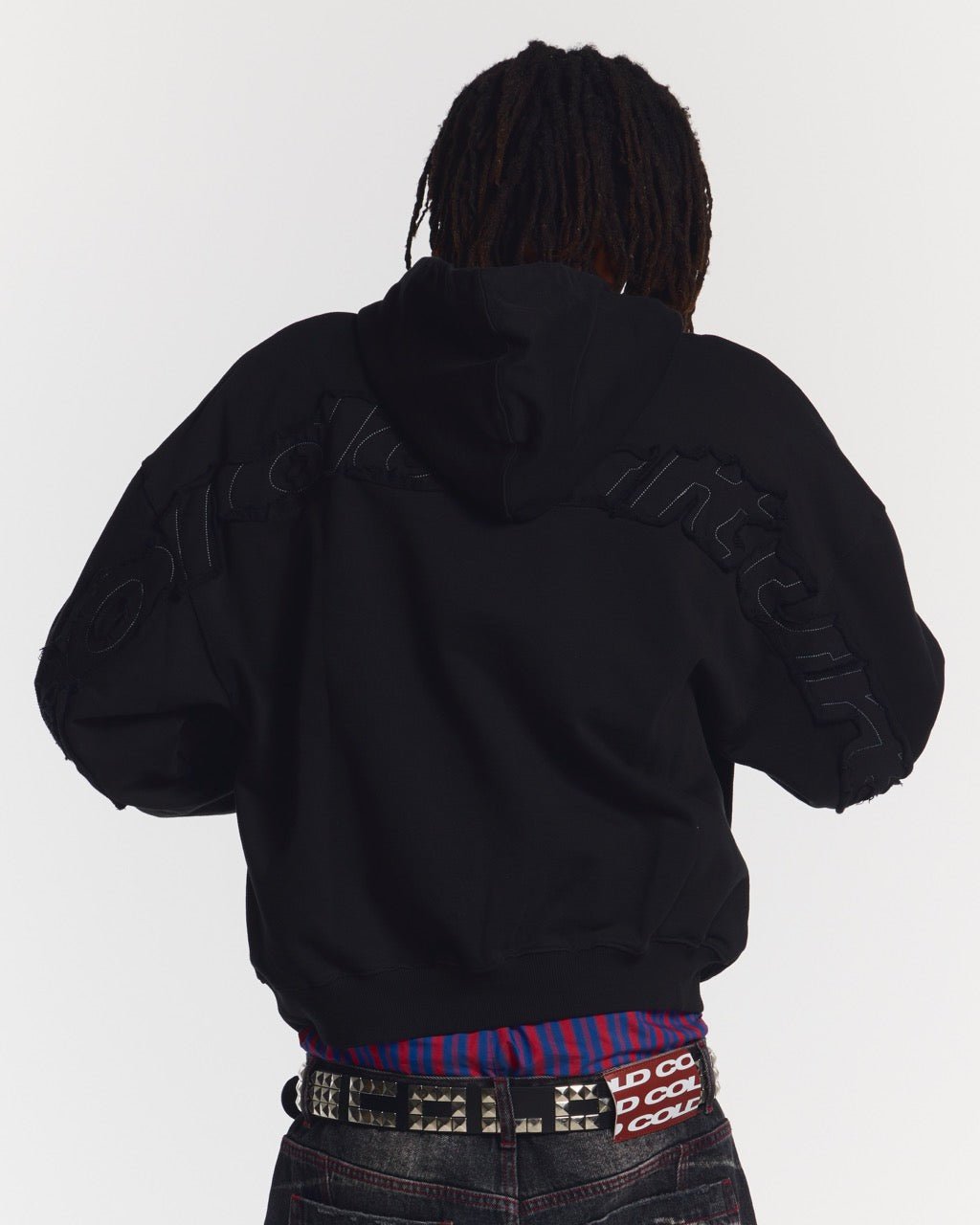 DISTRESS CURVED HOODIE BLACK - black distressed hoodie, back view on male model - Cold Culture #man