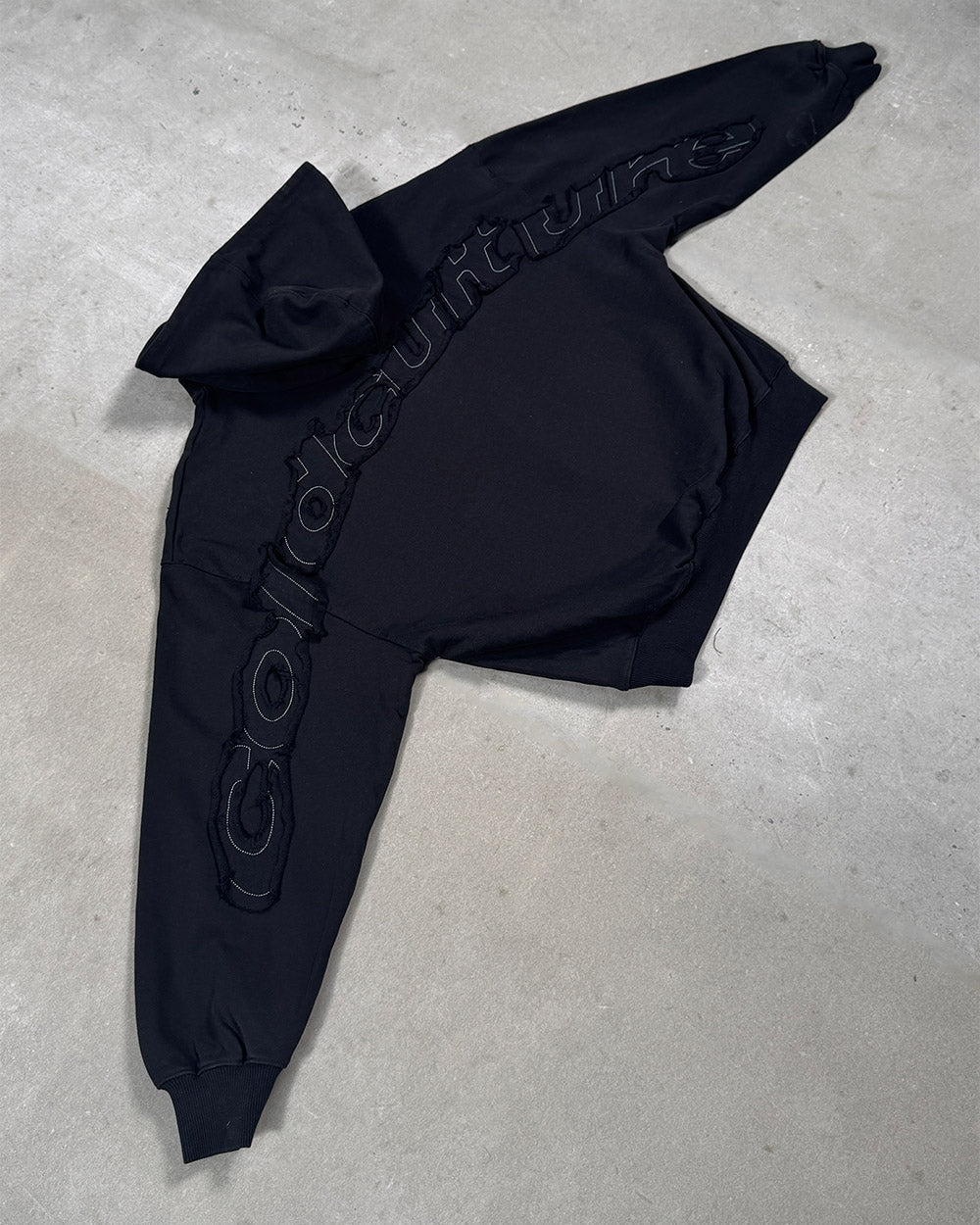 DISTRESS CURVED HOODIE BLACK - black distressed hoodie, flat lay - Cold Culture