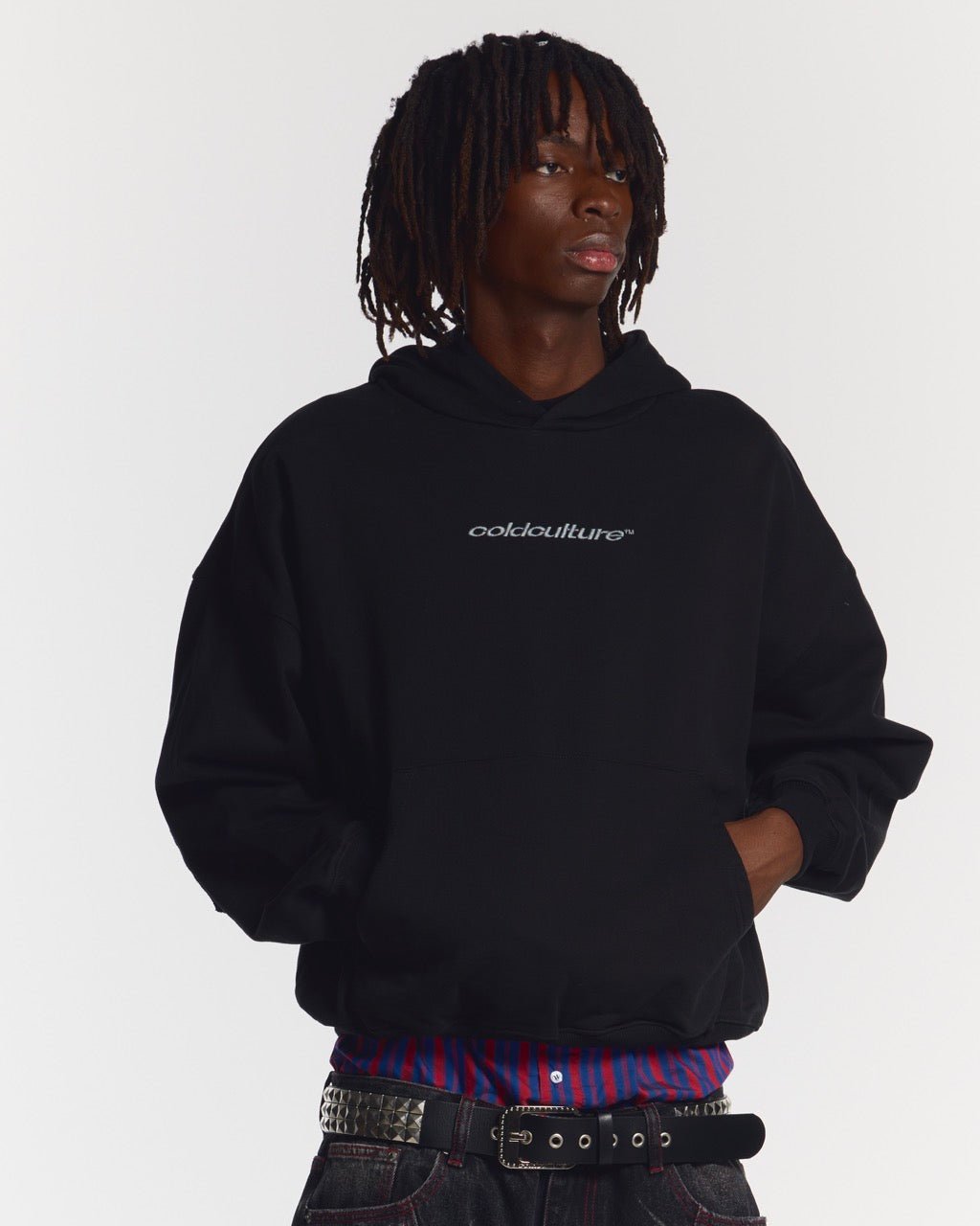 DISTRESS CURVED HOODIE BLACK - black distressed hoodie, front view on male model - Cold Culture #man