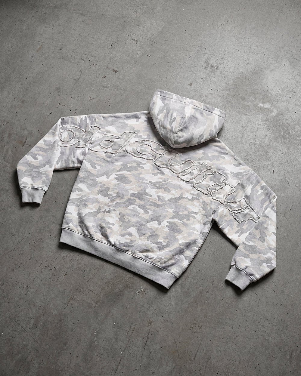 DISTRESS CURVED HOODIE CAMO GREY - grey camo hoodie, flat lay - Cold Culture