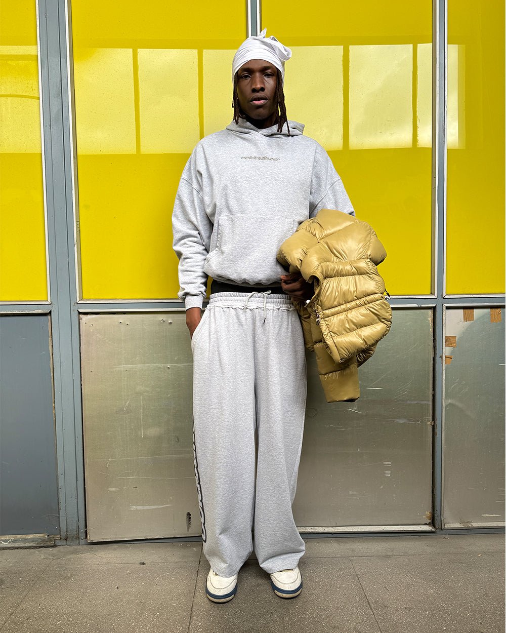 DISTRESS CURVED HOODIE LIGHT GREY - light grey distressed hoodie, street style shot - Cold Culture