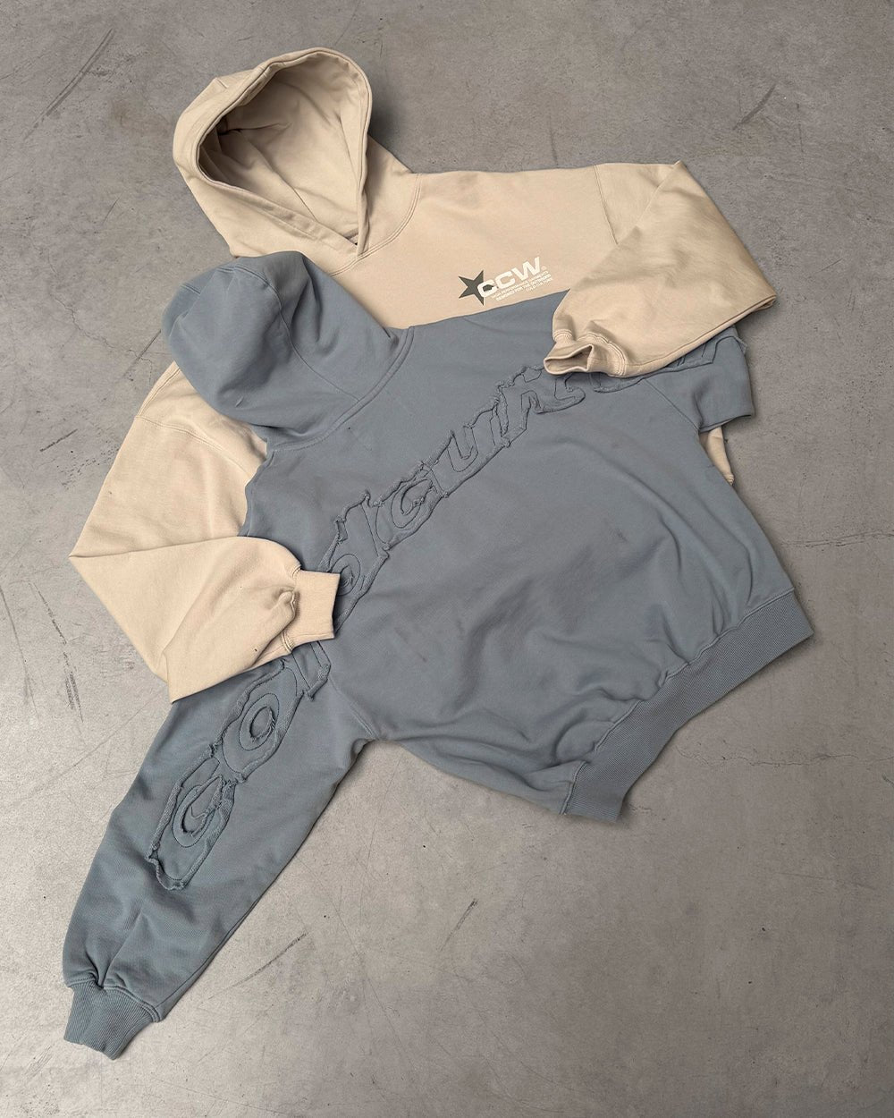 DISTRESS CURVED HOODIE SHADY BLUE - light blue distressed hoodie, flat lay with matching pieces - Cold Culture