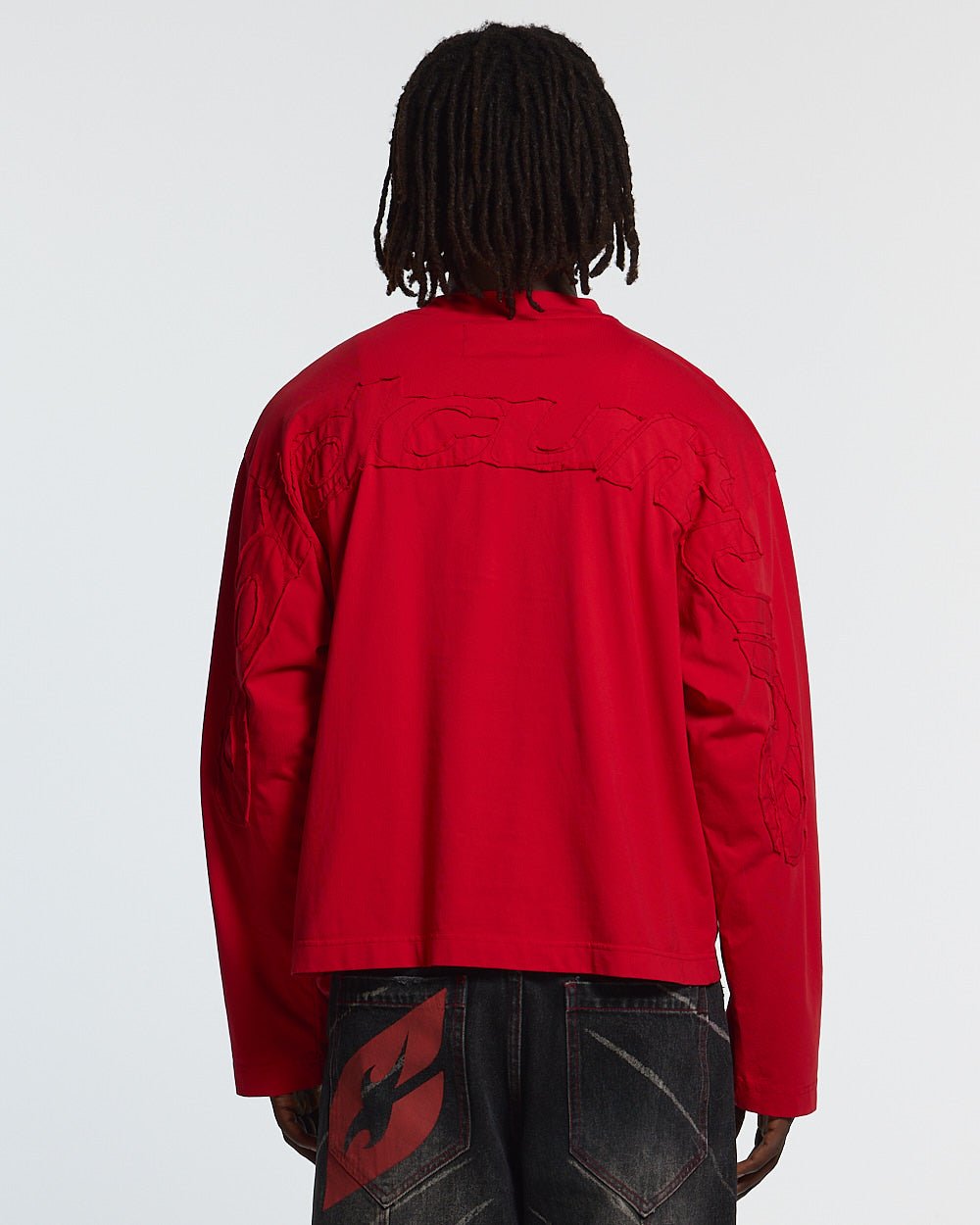 DISTRESS CURVED LONGSLEEVE RED - red distressed longsleeve tee, back view on male model - Cold Culture #man