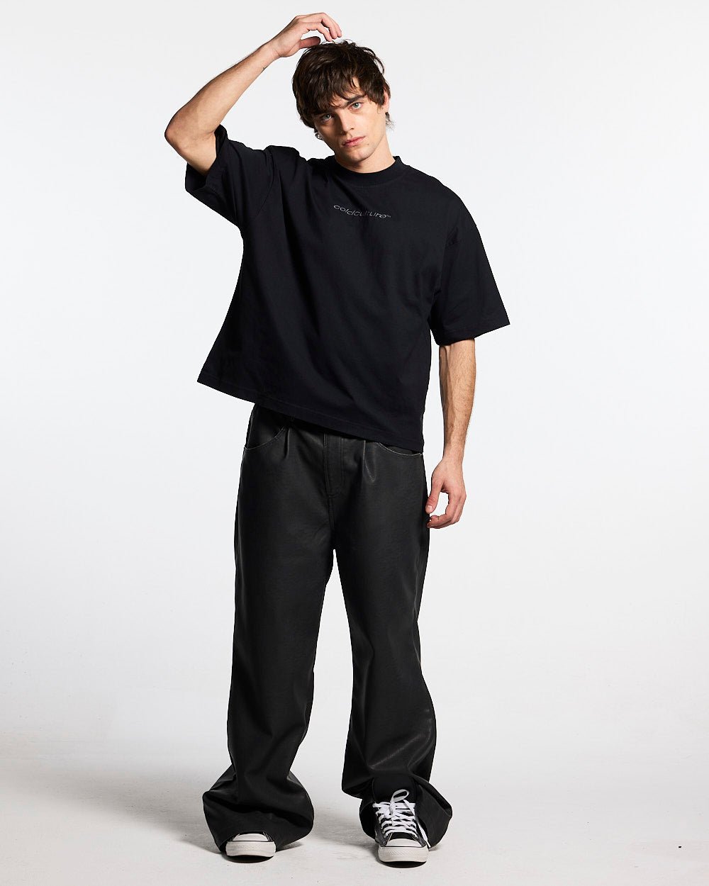 DISTRESS CURVED TEE BLACK - black distressed tee, front view on male model - Cold Culture #man