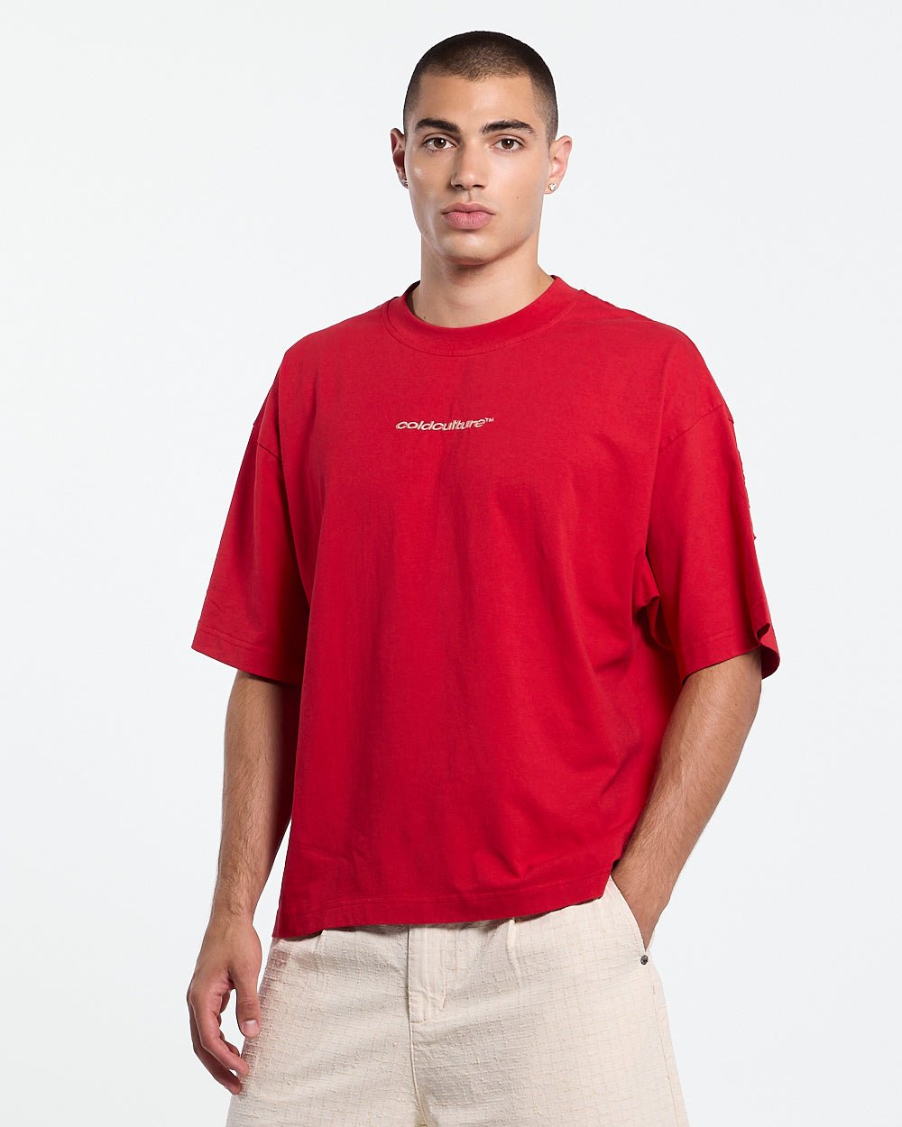 DISTRESS CURVED TEE RED - red distressed tee, front view on male model - Cold Culture #man