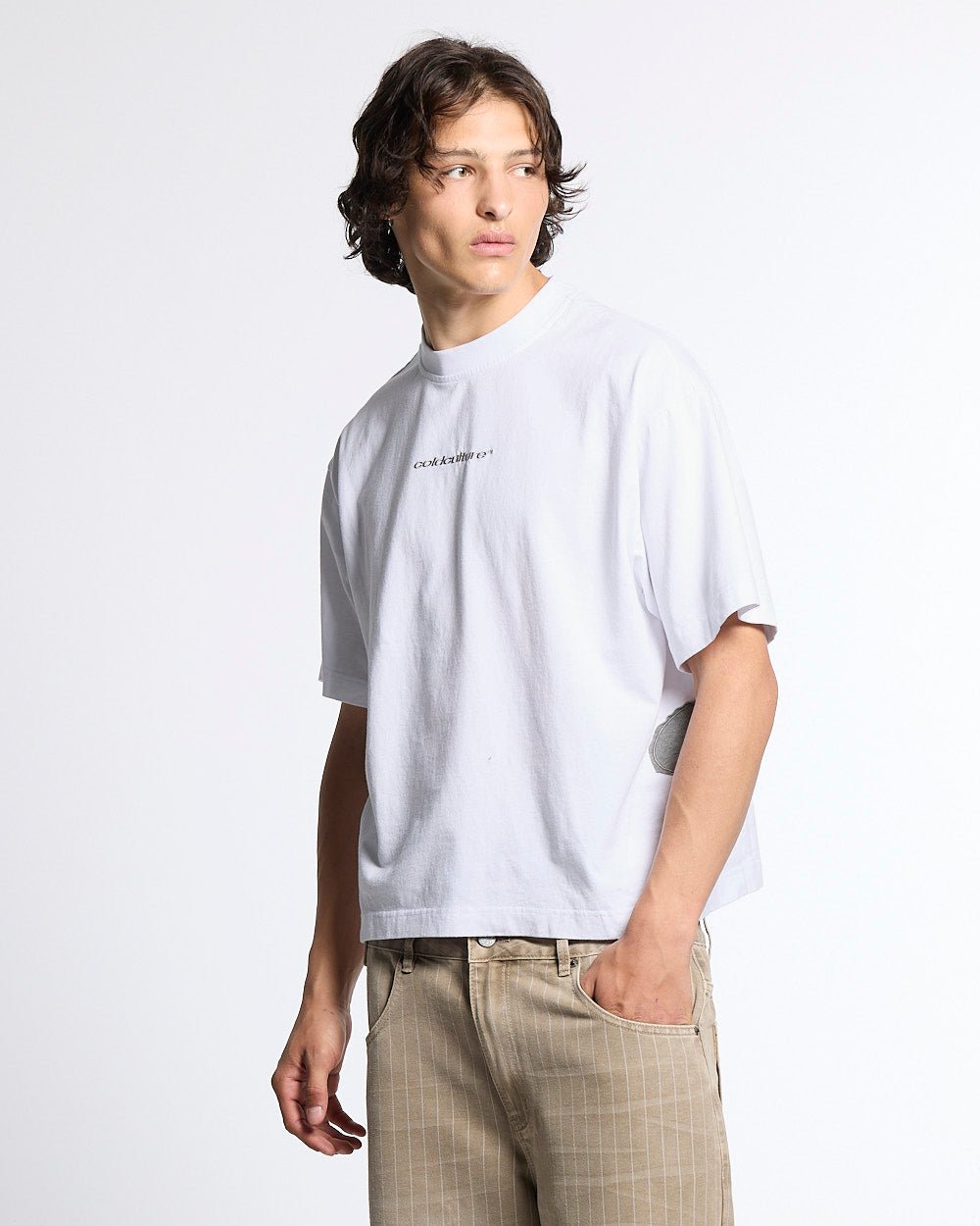 DISTRESS DEFENSE TEE WHITE - white graphic print tee, front view on male model - Cold Culture #man