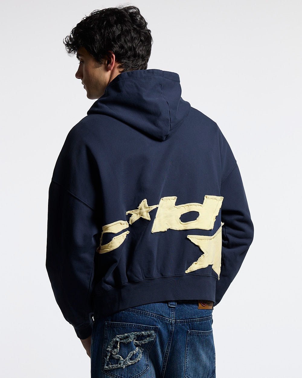 DISTRESSED DEFENSE HOODIE NAVY - navy distressed hoodie, back view on male model - Cold Culture #man
