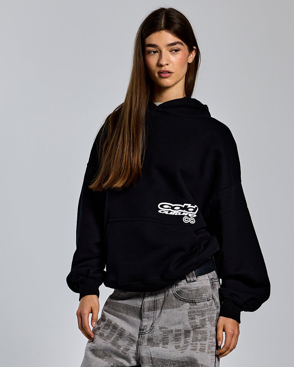 DOGS HOODIE BLACK - black graphic print hoodie, front view on female model - Cold Culture #woman