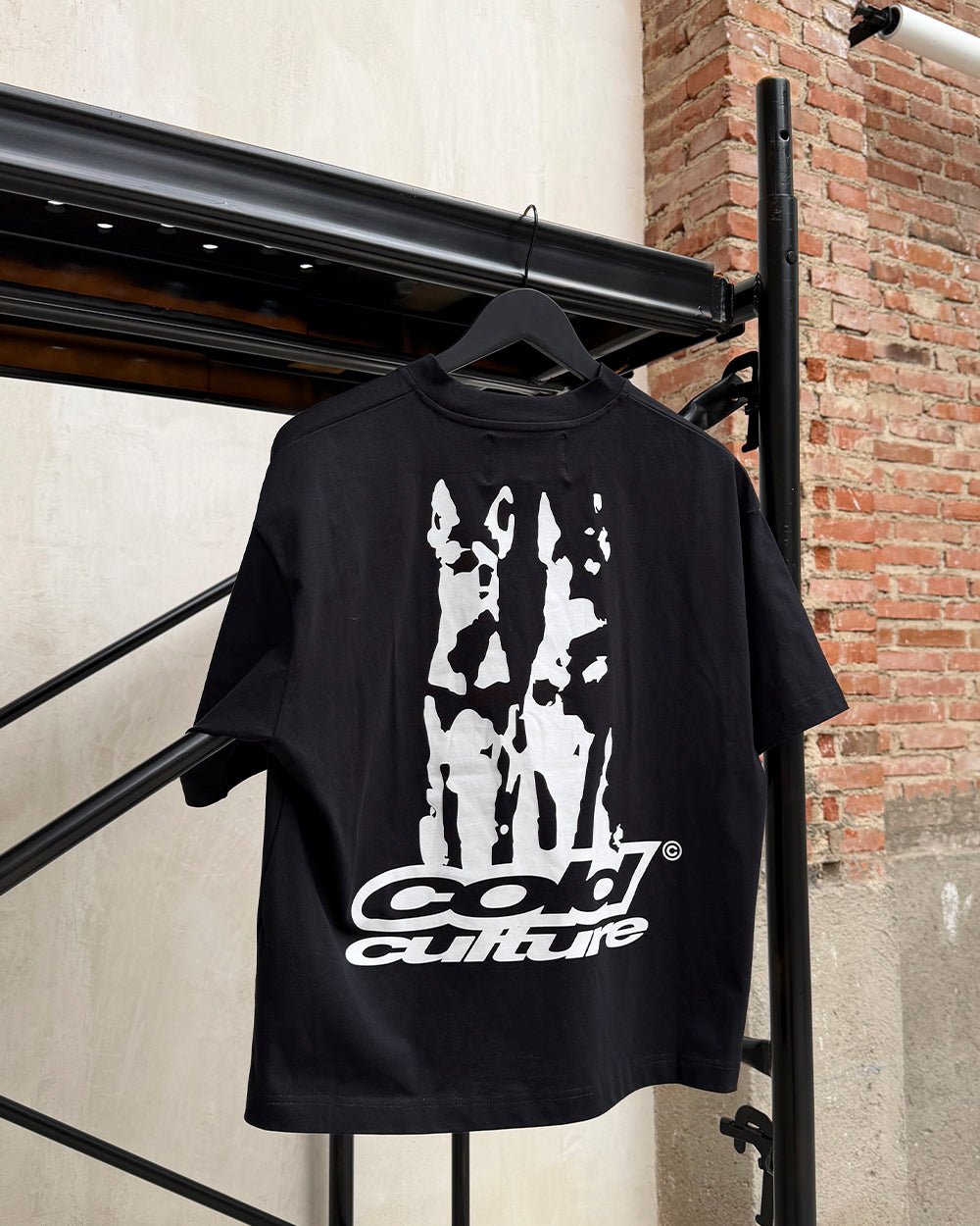 DOGS TEE BLACK - black graphic print tee, street style shot - Cold Culture
