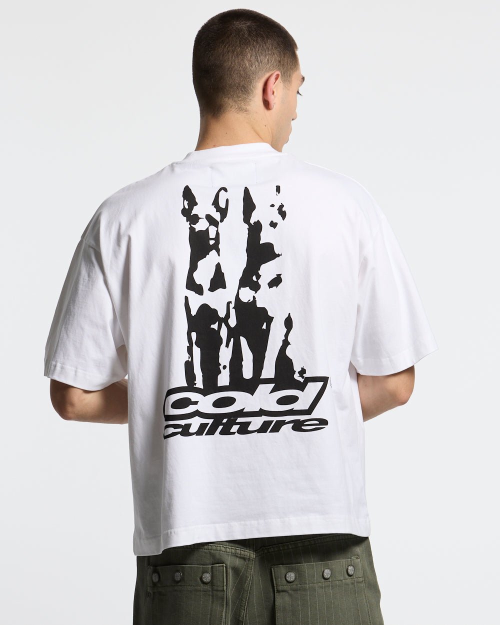 DOGS TEE WHITE - white oversized graphic tee, back view on male model - Cold Culture #man