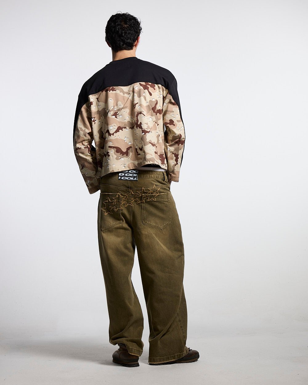 DOUBLE SIDED LONGSLEEVE CAMO - black and camo longsleeve tee, back view on male model - Cold Culture #man