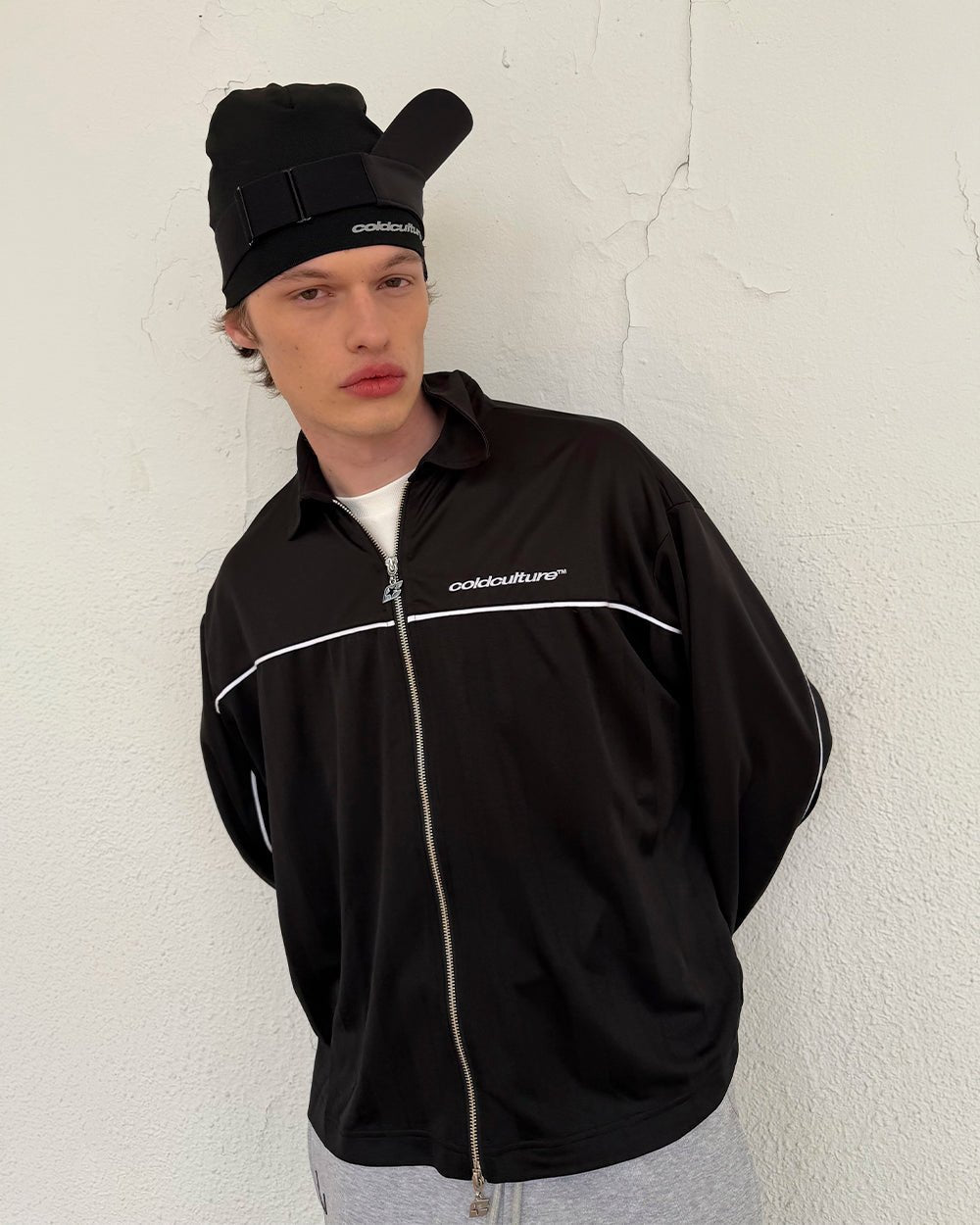 DRAW THE LINE LONGSLEEVE SHIRT BLACK - black zip track jacket, street style shot - Cold Culture #man