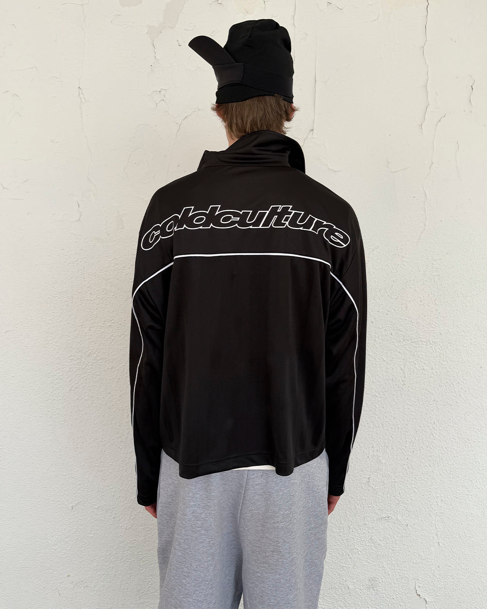 DRAW THE LINE LONGSLEEVE SHIRT BLACK - black zip track jacket, street style shot - Cold Culture #man