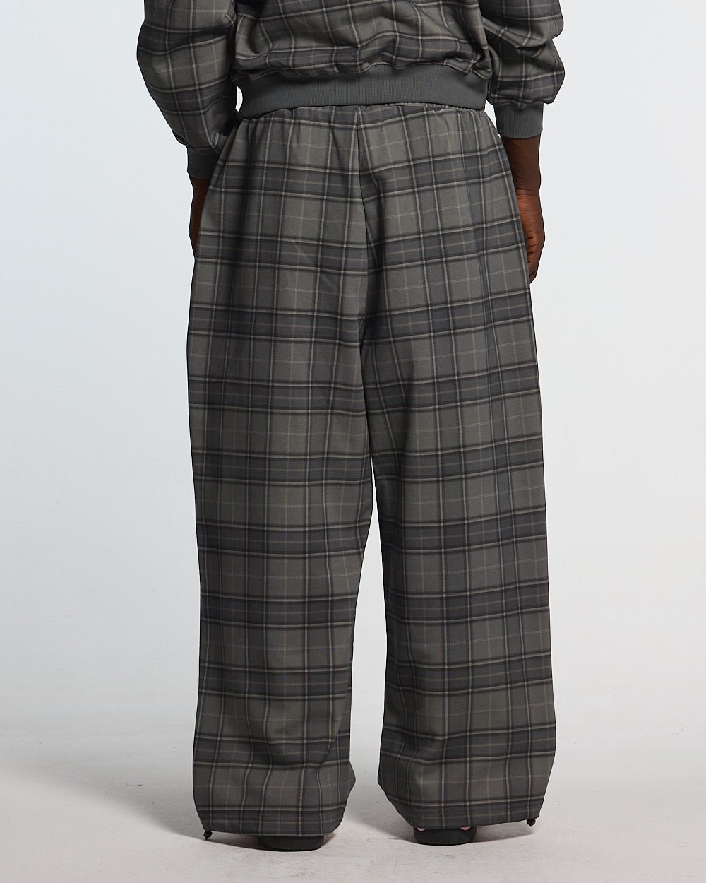 DRIFT SWEATPANTS GREY MIX - grey plaid sweatpants, back view on male model - Cold Culture
