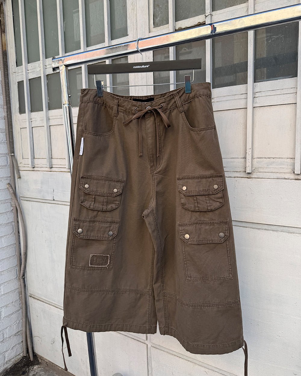 DUNE CAPRI PANTS BROWN - brown cargo capri pants, front view - Cold Culture