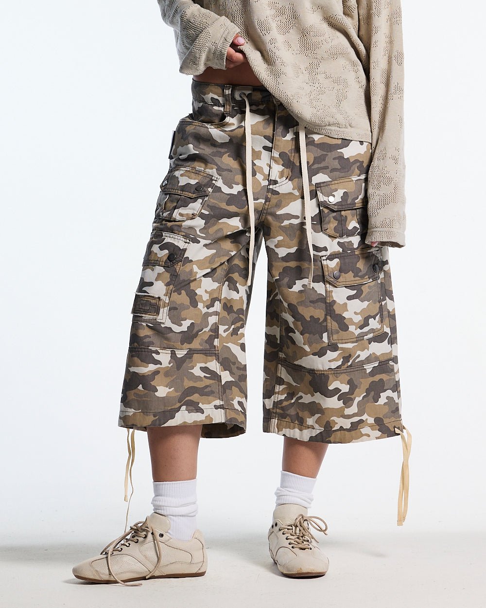 DUNE CAPRI PANTS CAMO - beige camo capri pants, front view on female model - Cold Culture #woman