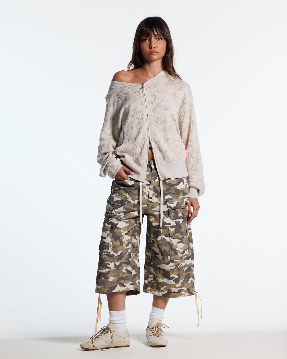 DUNE CAPRI PANTS CAMO - beige camo capri pants, front view on female model - Cold Culture #woman