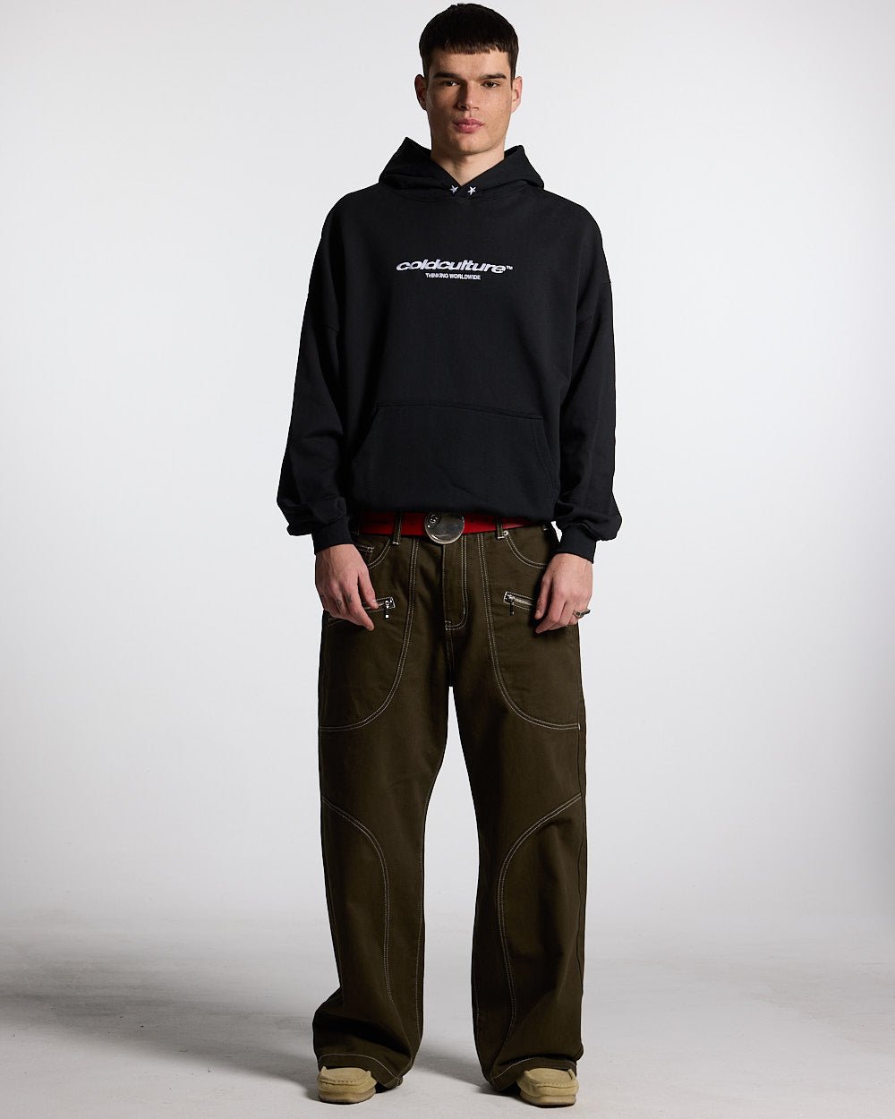 ESSENTIAL HOODIE BLACK - black oversized hoodie, front view on male model - Cold Culture #man