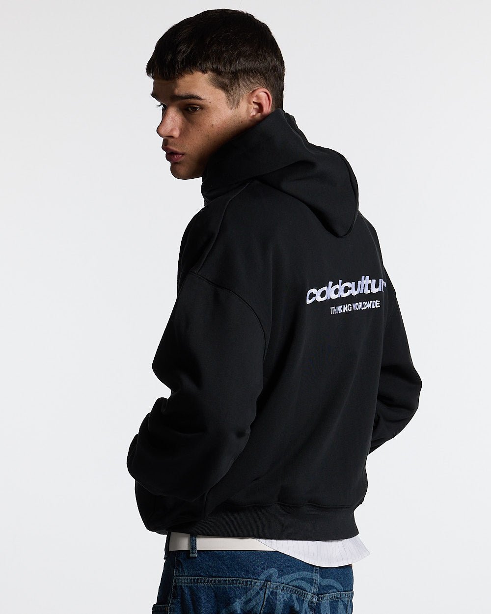 ESSENTIAL ZIP HOODIE BLACK - black zip-up hoodie, back view on male model - Cold Culture #man