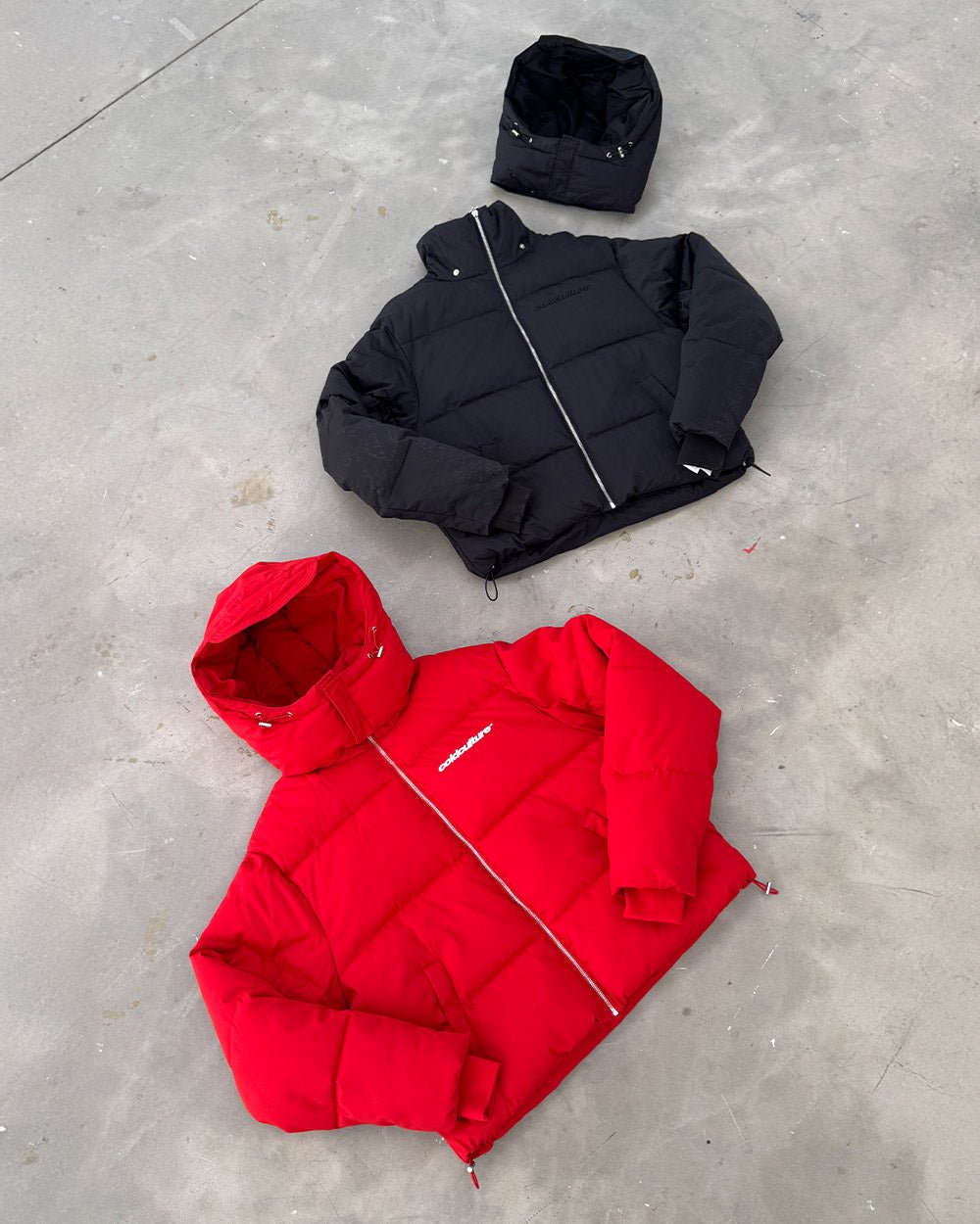 EVERYDAY PUFFER RED - red puffer jacket, flat lay with matching pieces - Cold Culture