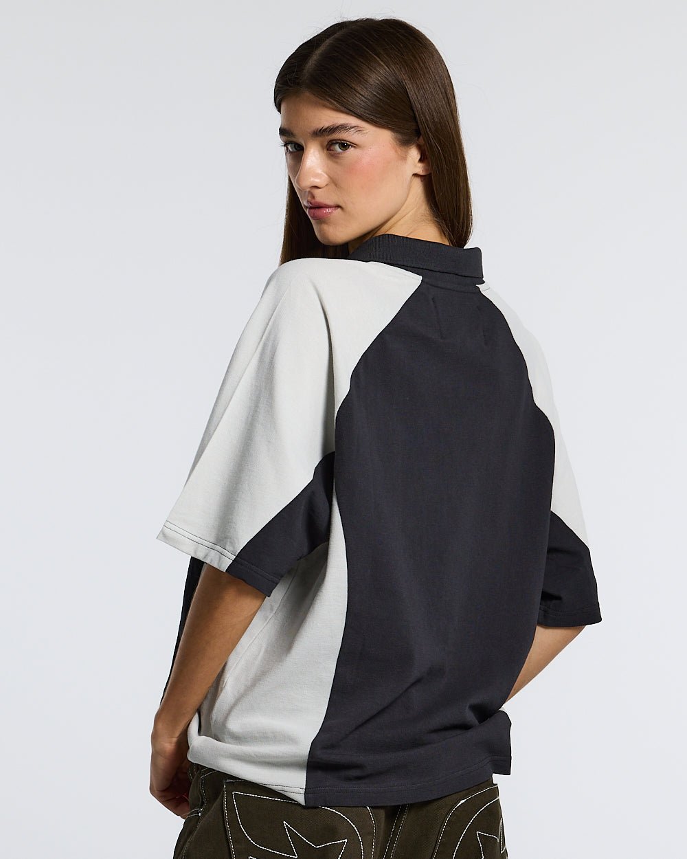 EXTREME POLO IRON GREY - grey two-tone zip polo shirt, back view on female model - Cold Culture #woman