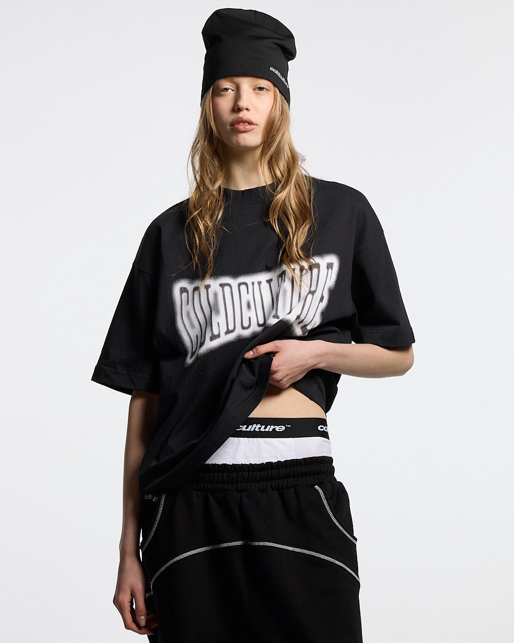 FEISTY TEE BLACK - black graphic print tee, front view on female model - Cold Culture #woman