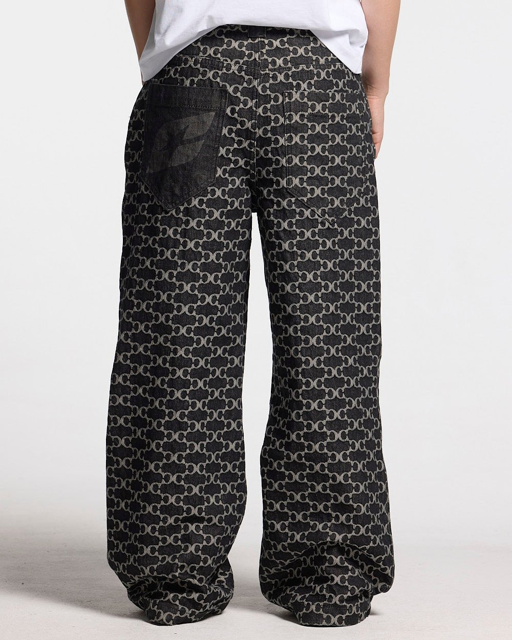 FEVER PANTS V3 BLACK - black monogram denim pants, back view on female model - Cold Culture #woman