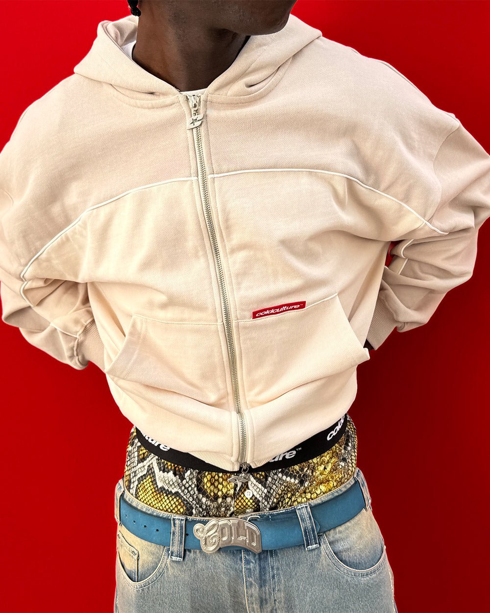 FLESH ZIP HOODIE BEIGE - beige zip-up hoodie, on model close-up - Cold Culture