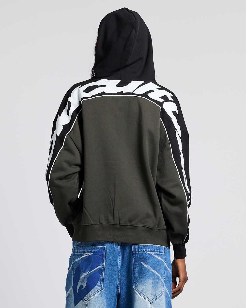 FLESH ZIP HOODIE BLACK & GREY - black and grey zip-up hoodie, back view on female model - Cold Culture #woman