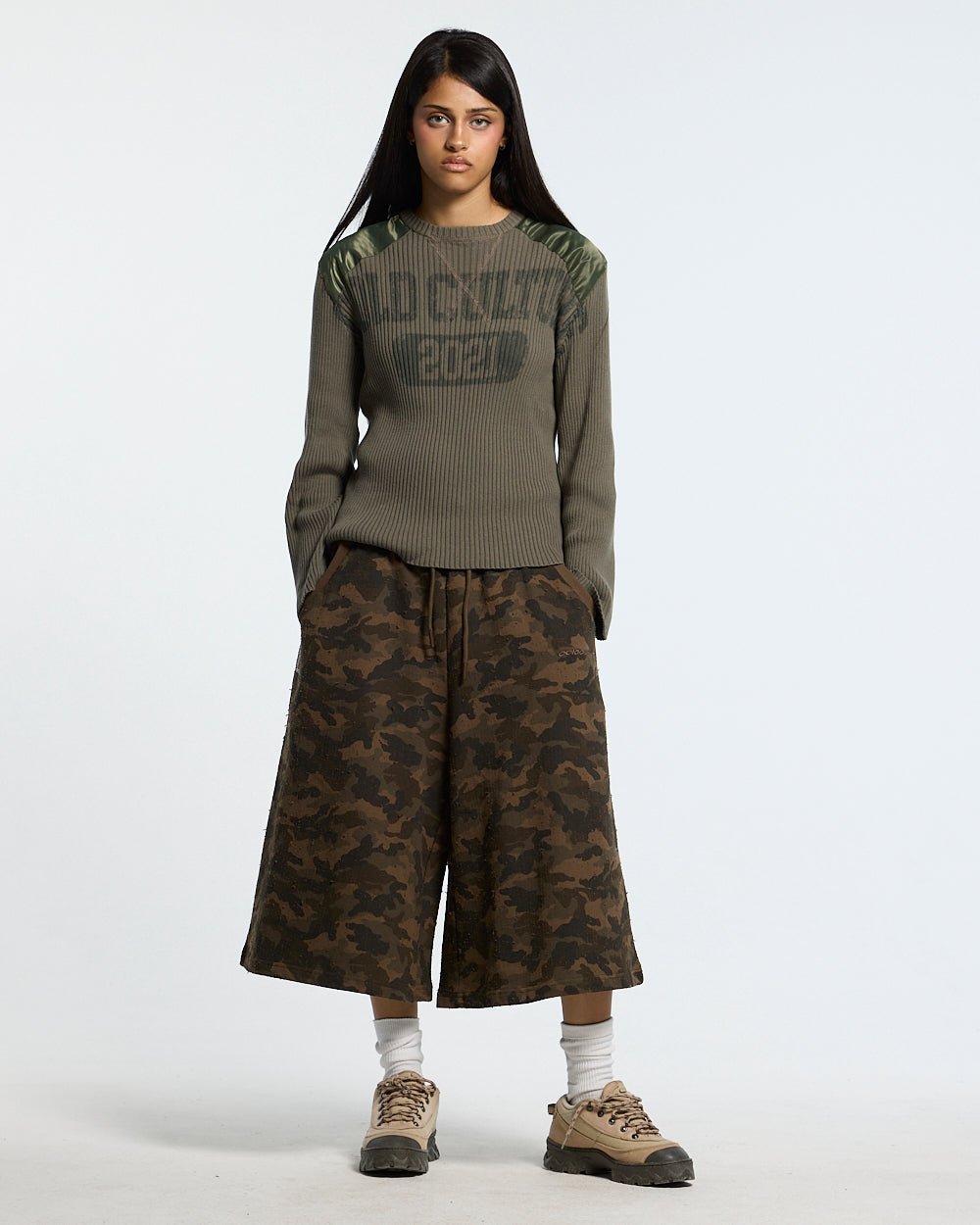 FRONT LINE JORTS GREEN - green camo shorts, front view on female model - Cold Culture #woman