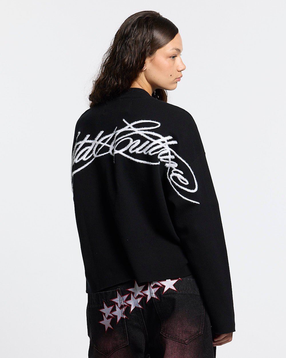 FURRY SCRIPT KNIT BLACK - black fuzzy script knit sweater, back view on female model - Cold Culture #woman