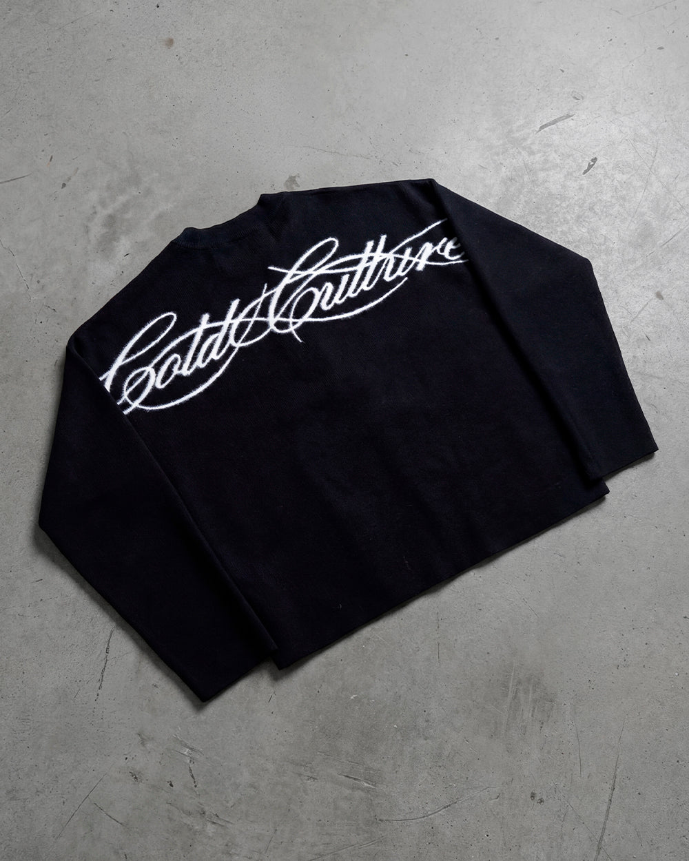 FURRY SCRIPT KNIT BLACK - black fuzzy script knit sweater, flat lay - Cold Culture