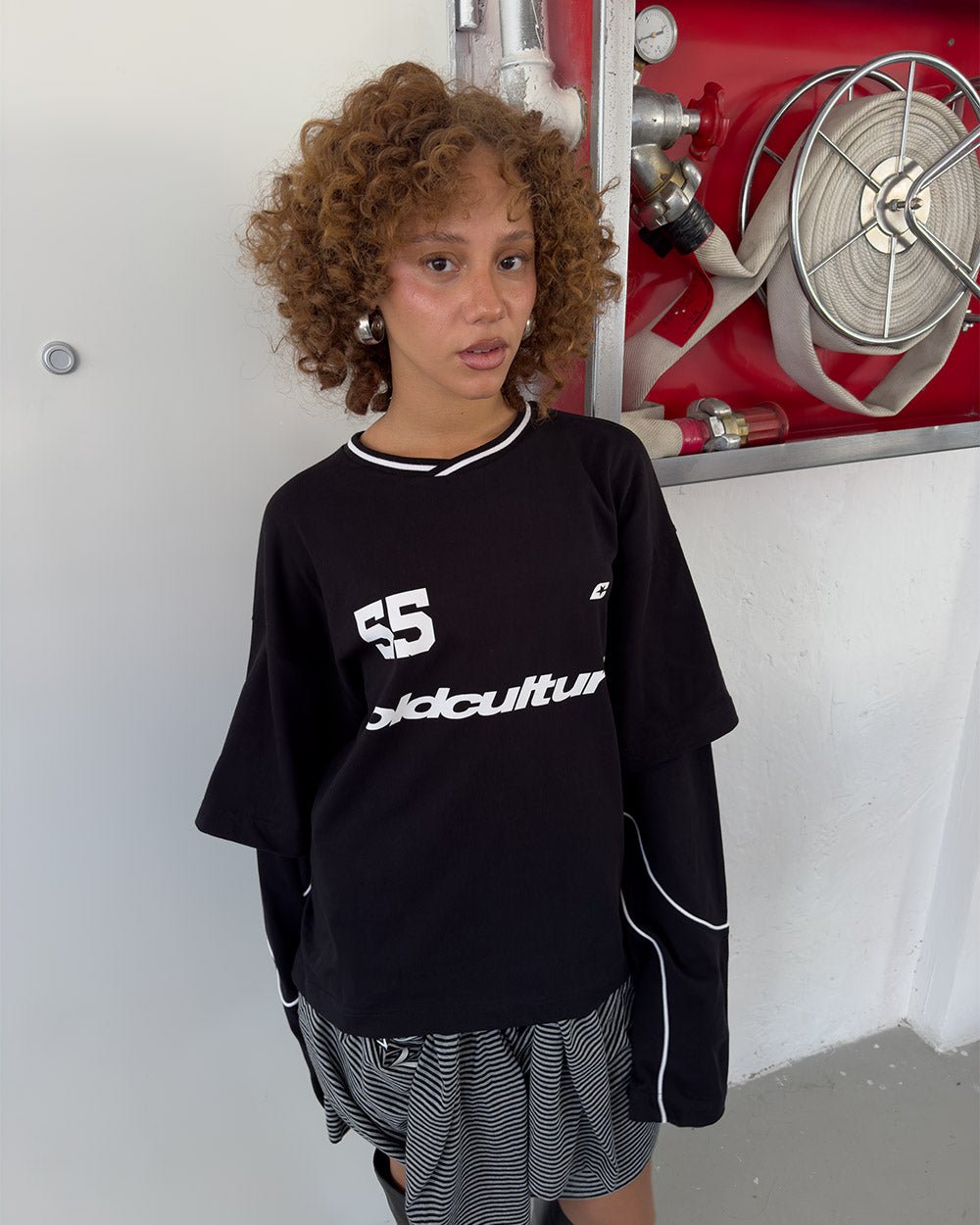 GAME ON LONGSLEEVE BLACK - black graphic print longsleeve tee, front view on female model - Cold Culture #woman