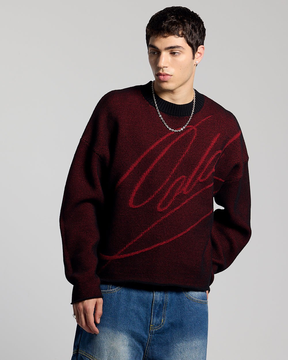 GRUBBY KNIT BLACK - black and red script knit sweater, front view on male model - Cold Culture #man