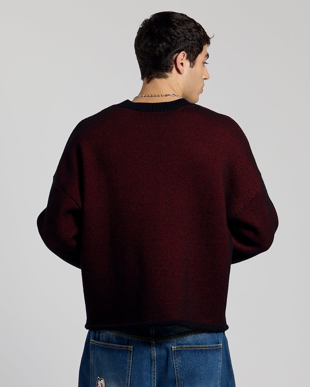 GRUBBY KNIT BLACK - black and red script knit sweater, back view on male model - Cold Culture #man
