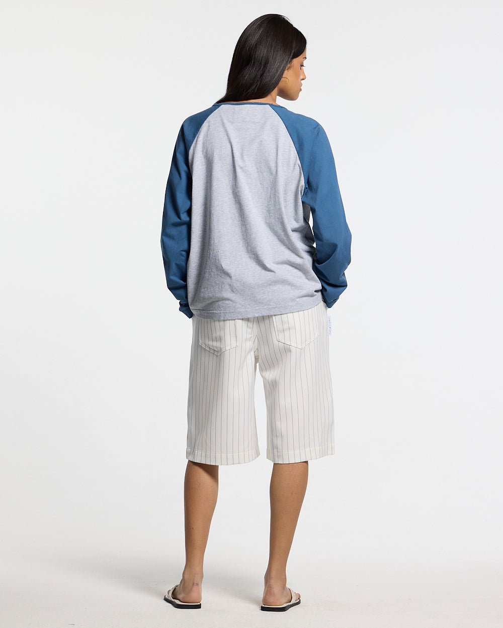 HARBOR JORTS WHITE - white pinstriped shorts, back view on female model - Cold Culture #woman