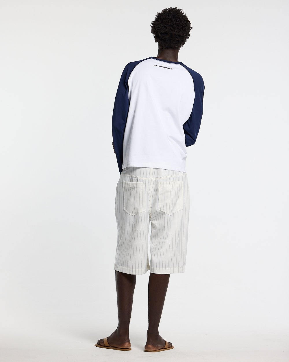 HARBOR JORTS WHITE - white pinstriped shorts, back view on male model - Cold Culture #man