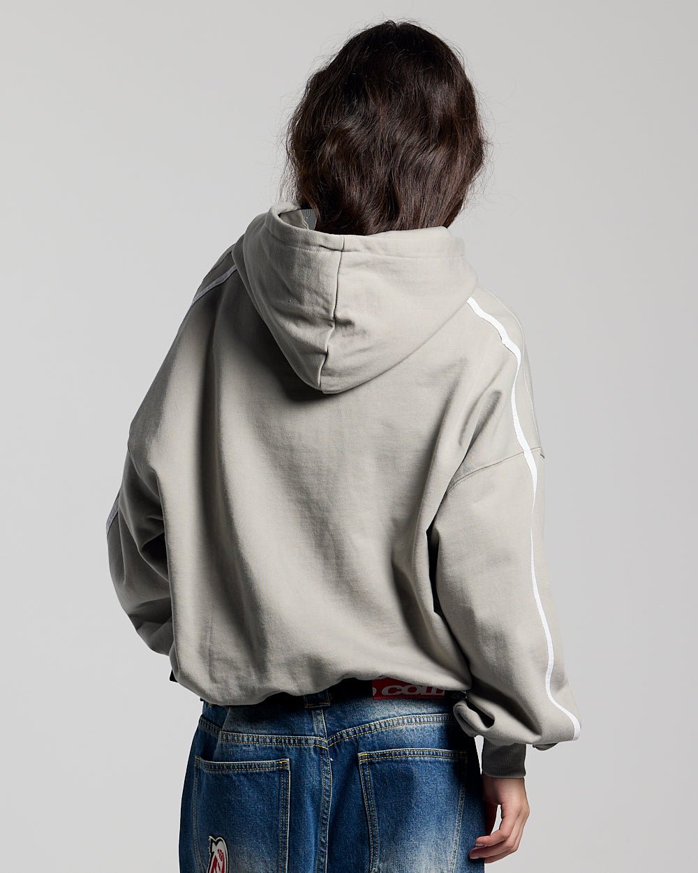 HIT THE TARGET HOODIE GREY - grey graphic print hoodie, back view on female model - Cold Culture #woman