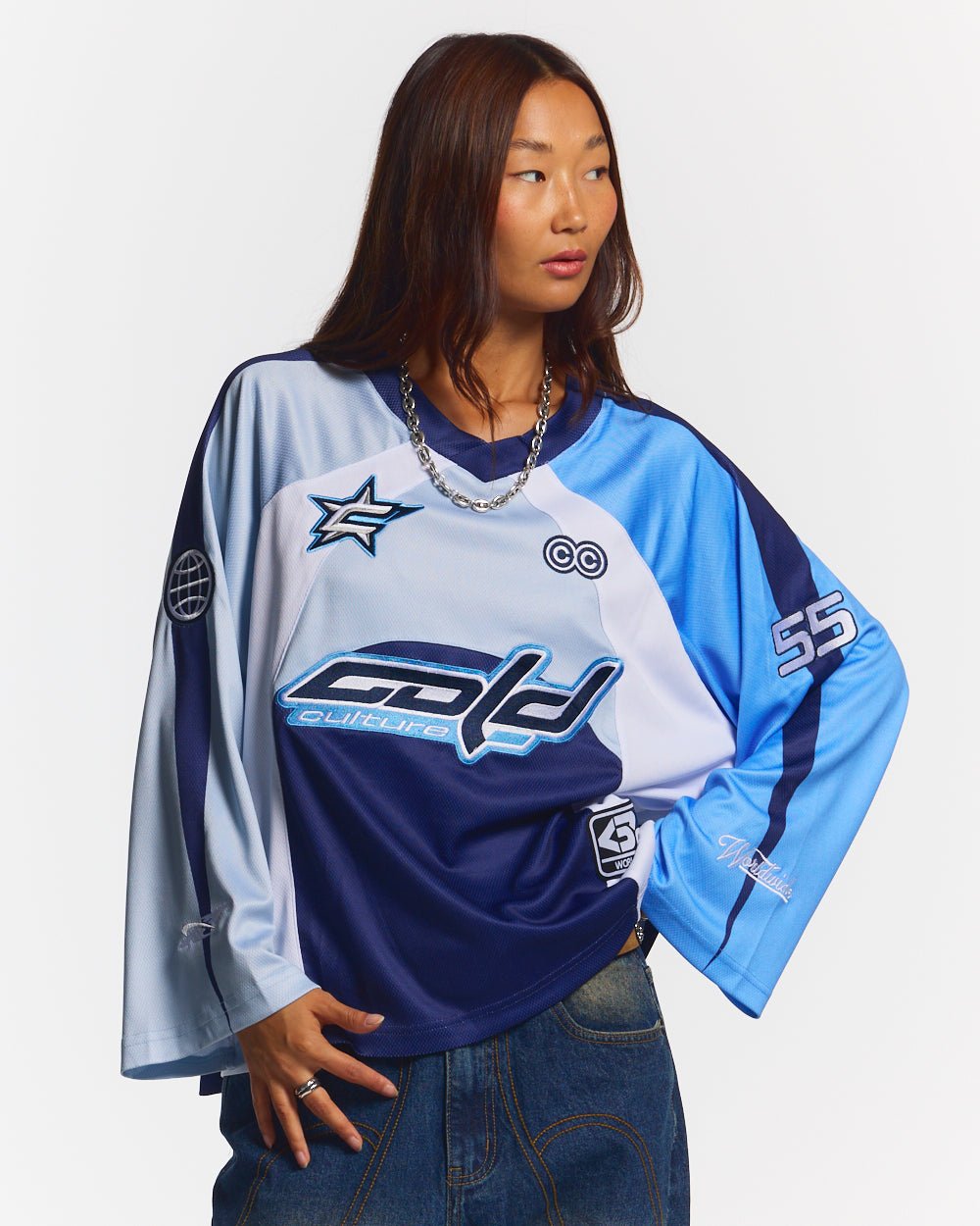 HOCKEY PLAYER LONGSLEEVE TEE NAVY/GLOSS BLUE - navy blue graphic print longsleeve tee, front view on female model - Cold Culture #woman