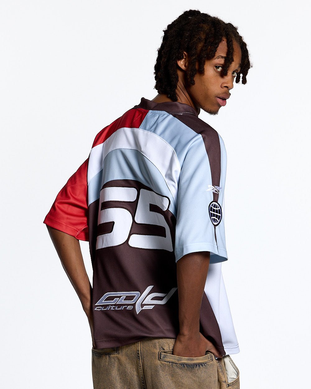 HOCKEY PLAYER TEE BROWN/ORANGE RED - brown and red graphic print tee, back view on male model - Cold Culture #man