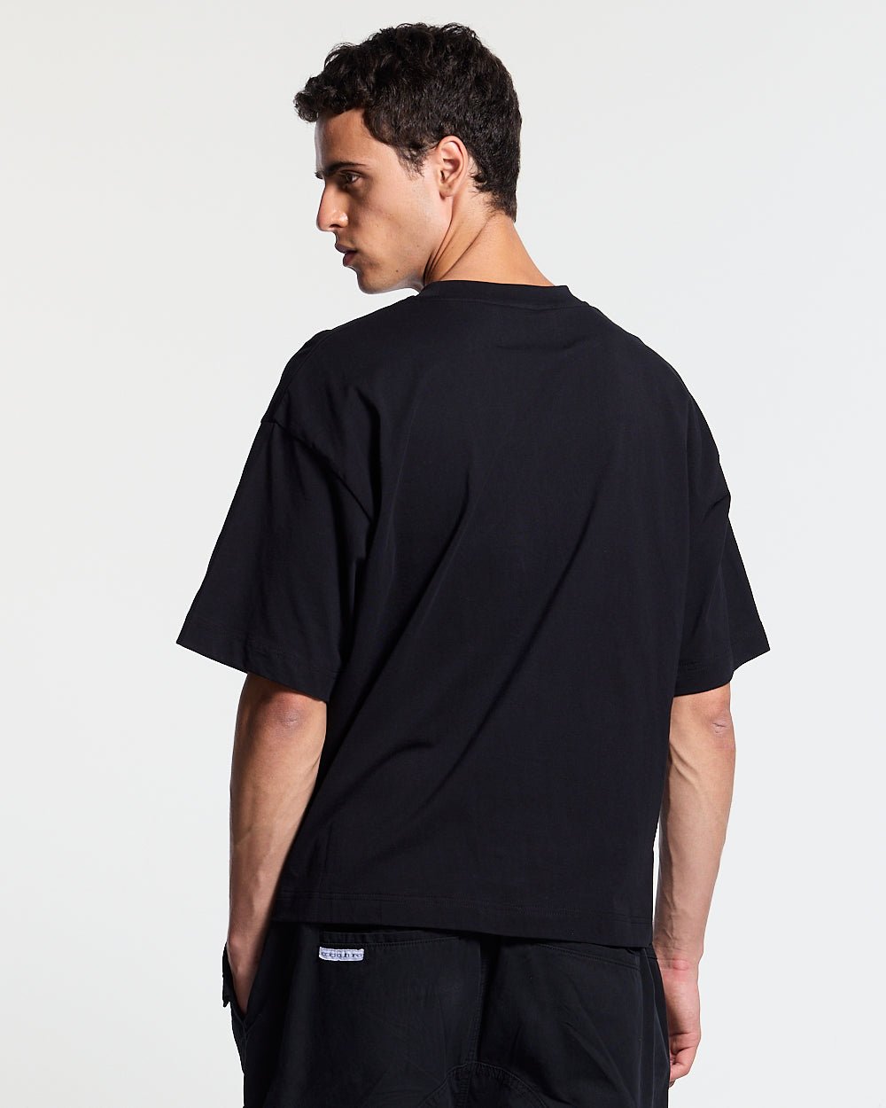 HOMERUN TEE BLACK - black graphic print tee, back view on male model - Cold Culture #man