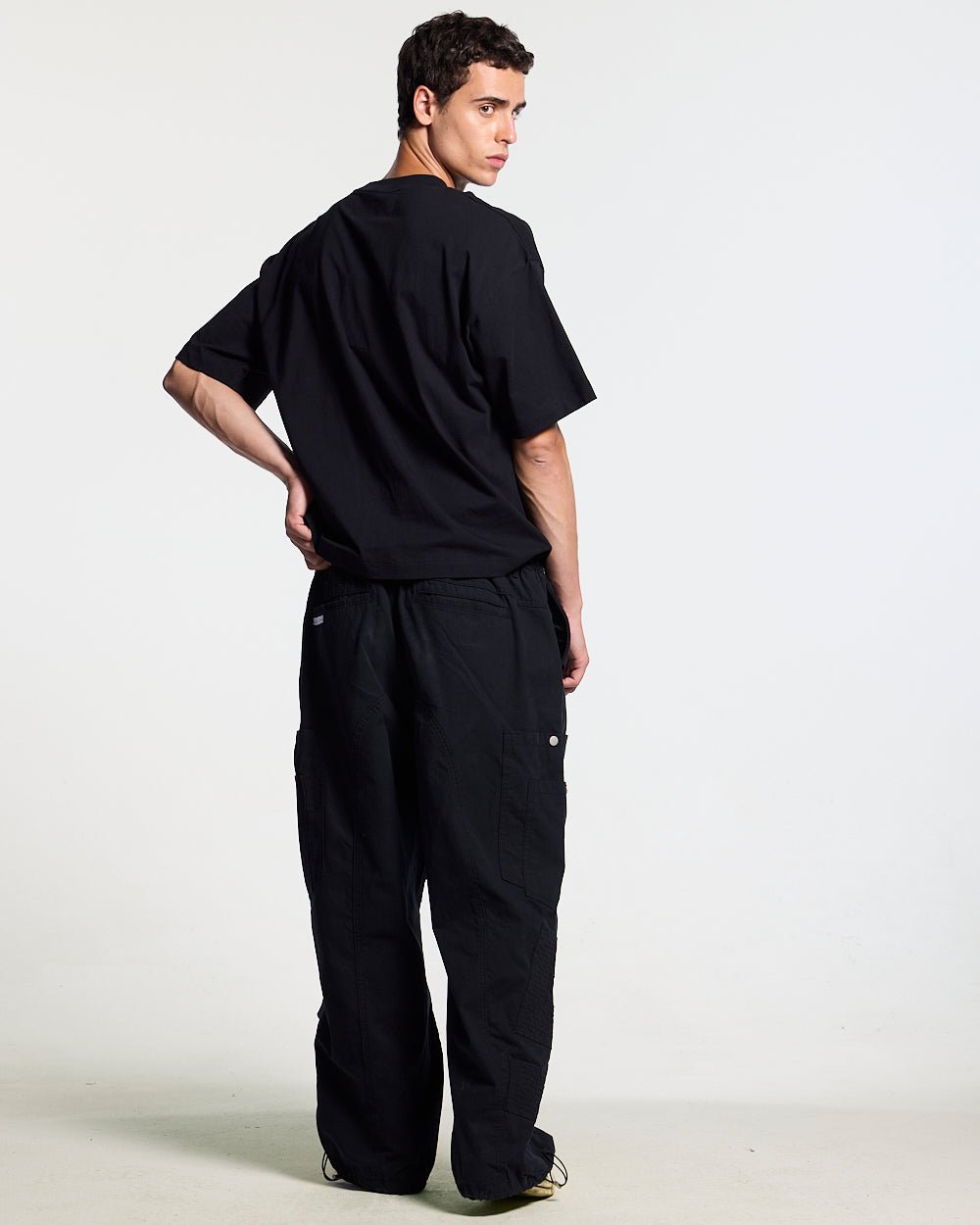 HOMERUN TEE BLACK - black graphic print tee, back view on male model - Cold Culture #man