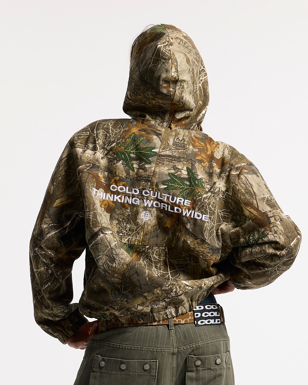 HOODED JACKET REALTREE - realtree camo hooded jacket, back view on female model - Cold Culture #woman